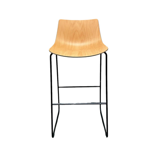 Allermuir wooden bar stool with slightly curved shell and black metal legs, from the front.